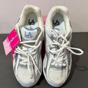 Women’s size 8 White and Silver Sneakers La Gear